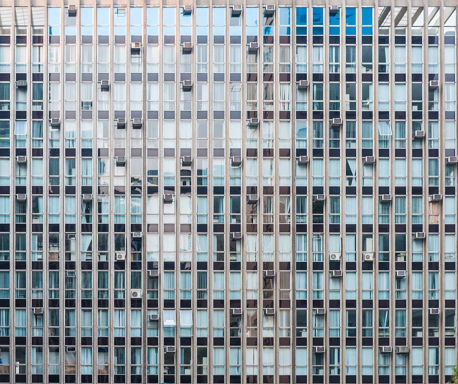 The repeating window grid of an office building on Avenida Paulista
